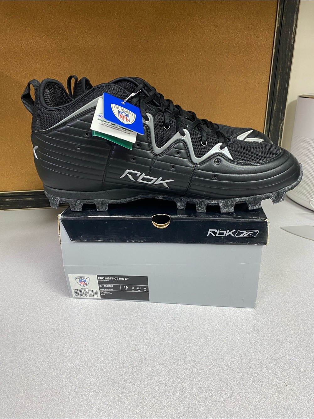 Reebok Black Football Cleats with Silver Accents